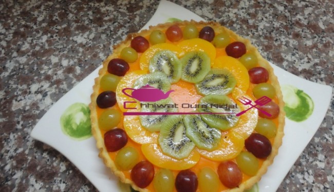 tarte crème orange, gateau, tarte fruit, décoration fruits, tarte facile, pate sablée, sablee, recette, cuisine marocaine, cuisine oum nidal, chhiwate, شهيوات مغربية, أم نضال, طارت الليمون, طارت الفواكه, طارت مزينة, كريم البرتقال, كريم الليمون, كريمة, عجين الصابلي, عجينة, وصفة, حلويات, حلوى