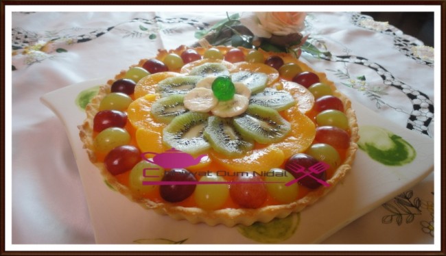 tarte crème orange, gateau, tarte fruit, décoration fruits, tarte facile, pate sablée, sablee, recette, cuisine marocaine, cuisine oum nidal, chhiwate, شهيوات مغربية, أم نضال, طارت الليمون, طارت الفواكه, طارت مزينة, كريم البرتقال, كريم الليمون, كريمة, عجين الصابلي, عجينة, وصفة, حلويات, حلوى