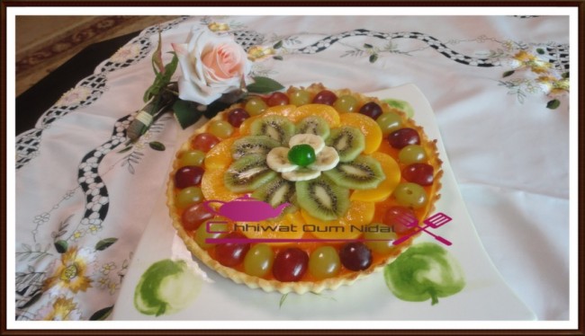 tarte crème orange, gateau, tarte fruit, décoration fruits, tarte facile, pate sablée, sablee, recette, cuisine marocaine, cuisine oum nidal, chhiwate, شهيوات مغربية, أم نضال, طارت الليمون, طارت الفواكه, طارت مزينة, كريم البرتقال, كريم الليمون, كريمة, عجين الصابلي, عجينة, وصفة, حلويات, حلوى