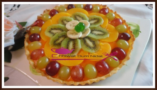 tarte crème orange, gateau, tarte fruit, décoration fruits, tarte facile, pate sablée, sablee, recette, cuisine marocaine, cuisine oum nidal, chhiwate, شهيوات مغربية, أم نضال, طارت الليمون, طارت الفواكه, طارت مزينة, كريم البرتقال, كريم الليمون, كريمة, عجين الصابلي, عجينة, وصفة, حلويات, حلوى