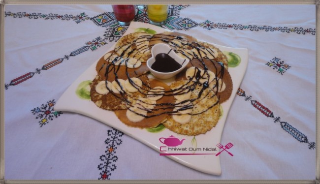 pancake, chhiwate, pan cake, pan cake crème chocolat, pan cake crème chantilly, cuisine marocaine, cuisine oum nidal, cuisineoumnidal, facile, gateau, om nidal, recette, recette facile, pancake chocolat banane, sucree, أطباق حلوة, أم نضال, ام نضال, حلويات, رغيفات حلوة, شهيوات, شهيوات مغربية, فطائر حلوة, بان كيك, بانكيك, بان كيك الشوكولا و الموز, بان كيك بكريم الشانتيي, بان كيك بكريم الشوكولا, مطبخ أم نضال, وصفات, وصفة, وصفة سهلة