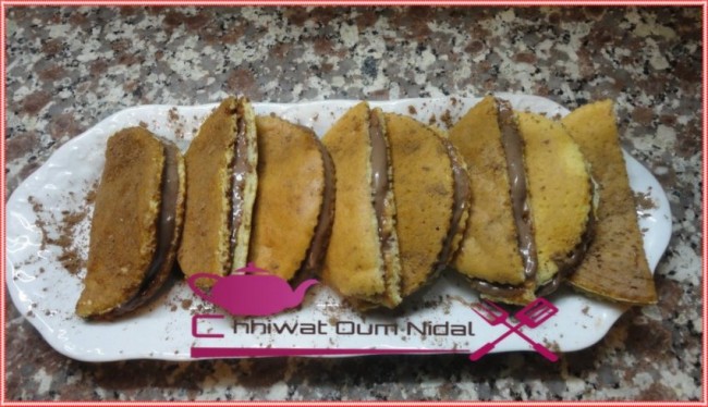 pancake, chhiwate, pan cake, pan cake crème chocolat, pan cake crème chantilly, cuisine marocaine, cuisine oum nidal, cuisineoumnidal, facile, gateau, om nidal, recette, recette facile, pancake chocolat banane, sucree, أطباق حلوة, أم نضال, ام نضال, حلويات, رغيفات حلوة, شهيوات, شهيوات مغربية, فطائر حلوة, بان كيك, بانكيك, بان كيك الشوكولا و الموز, بان كيك بكريم الشانتيي, بان كيك بكريم الشوكولا, مطبخ أم نضال, وصفات, وصفة, وصفة سهلة