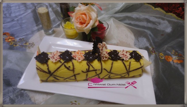 buche imprimée, imprimee, cake roulé, roulee, génoise, cigarette, pate, chocolat, cacao, crèma patissière, creme, poudre amande, biscuit jocande, boudoires, recette, cuisine marocaine, bonne année, nouvelle année, chhiwate cuisine oum nidal, كيك ملفوف, رولي, وصفة, كاطو, جينوازو جينواز, لوز, شهيوات مغربية, حلويات, أطباق حلوة, كريمة حلوانية, مطبخ أم نضال, شوكولا, كاكاو, رأس السنة