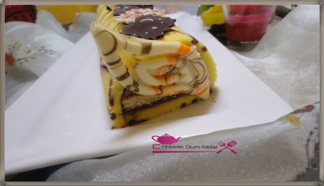 buche imprimée, imprimee, cake roulé, roulee, génoise, cigarette, pate, chocolat, cacao, crèma patissière, creme, poudre amande, biscuit jocande, boudoires, recette, cuisine marocaine, bonne année, nouvelle année, chhiwate cuisine oum nidal, كيك ملفوف, رولي, وصفة, كاطو, جينوازو جينواز, لوز, شهيوات مغربية, حلويات, أطباق حلوة, كريمة حلوانية, مطبخ أم نضال, شوكولا, كاكاو, رأس السنة