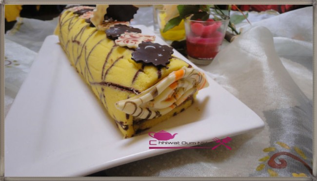 buche imprimée, imprimee, cake roulé, roulee, génoise, cigarette, pate, chocolat, cacao, crèma patissière, creme, poudre amande, biscuit jocande, boudoires, recette, cuisine marocaine, bonne année, nouvelle année, chhiwate cuisine oum nidal, كيك ملفوف, رولي, وصفة, كاطو, جينوازو جينواز, لوز, شهيوات مغربية, حلويات, أطباق حلوة, كريمة حلوانية, مطبخ أم نضال, شوكولا, كاكاو, رأس السنة