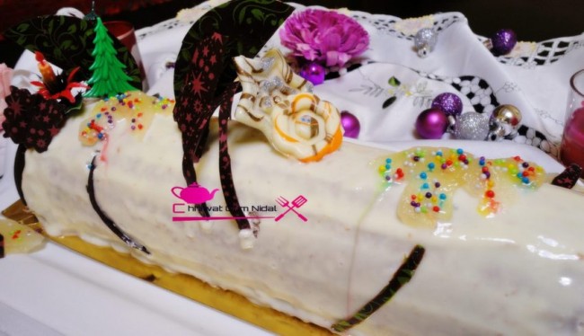 buche, creme poire, crème, cake roulee, gateau, nouvelle annee, bonne année, cuisine marocaine, recette, chocolat, cacao, cuisine oum nidal, génoise, genoise, sucree, anniversaire, fete, كيك ملفوف, رولي, رأس السنة, مناسبات, كاطو, حلوى, حلويات, شهيوات مغربية, وصفة, كريم الاجاص, كريمة, شوكولا, كاكاو, كيك مزين, أم نضال, جنواز, جينواز  