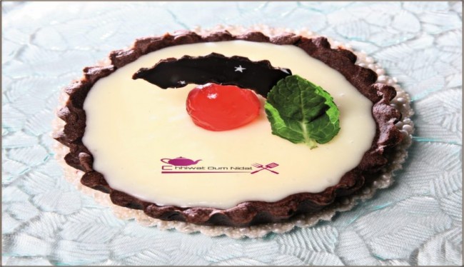 tartelette chocolat blanc, ganache chocolat, anniversaire, cacao, chhiwate, creme, crème chocolat blanc, cuisine, cuisine marocaine, cuisine oum nidal, cuisineoumnidal, gateau, marron, oum nidal, om nidal, pate chocolat, pate tarte chocolat, petite tarte, recette, sucree, tartelette chocolat blanc, أطباق حلوة, أم نضال, ام نضال, حلوى, حلويات, شهيوات, شهيوات مغربية, طارت صغيرة, طارتوليت الشوكولا البيضاء, طورتات صغيرة, عجين الطارت بالشوكولا, عجينة, عيد ميلاد, كريم الشوكولا, كريما, كريمة, محليات, مطبخ, كناش الشوكولا, مطبخ أم نضال 