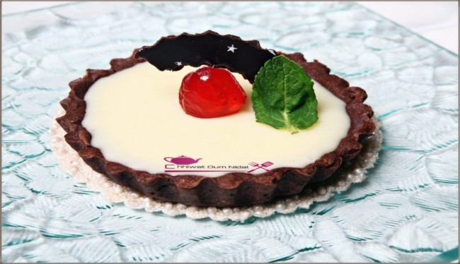 tartelette chocolat blanc, ganache chocolat, anniversaire, cacao, chhiwate, creme, crème chocolat blanc, cuisine, cuisine marocaine, cuisine oum nidal, cuisineoumnidal, gateau, marron, oum nidal, om nidal, pate chocolat, pate tarte chocolat, petite tarte, recette, sucree, tartelette chocolat blanc, أطباق حلوة, أم نضال, ام نضال, حلوى, حلويات, شهيوات, شهيوات مغربية, طارت صغيرة, طارتوليت الشوكولا البيضاء, طورتات صغيرة, عجين الطارت بالشوكولا, عجينة, عيد ميلاد, كريم الشوكولا, كريما, كريمة, محليات, مطبخ, كناش الشوكولا, مطبخ أم نضال 