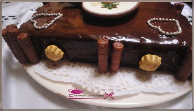 anniversaire, chhiwate, couche croquante, fete mariage, cuisine marocaine, cuisine oum nidal, gateau, gateau anniversaire, gateau chocolat et vanille, gateau glacé, gateau chocolat, gateaux fetes, gateau praliné noisette, glacage chocolat, génoise, om nidal, recette, sucree, أطباق حلوة, أم نضال, الجينواز, ام نضال, كاطو كلاصي بالشوكولا و براليني النوازيت, حلوى, حلوى المناسبات, حلوى عيد الميلاد, حلويات, حلويات العيد, شهيوات, شهيوات مغربية, طارت, طارت كلاصي, طبقة مقرمشة, عيد ميلاد, كاطو, كاطو المناسبات, كاطو عيد الميلاد, كاطو كلاصي بالشوكولا, كلاصاج الشوكولا, مطبخ أم نضال, مناسبات