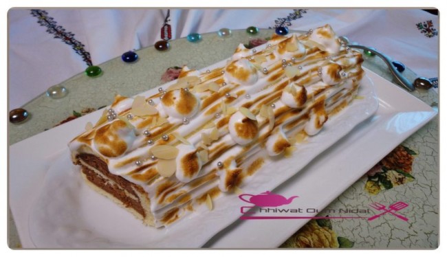 anniversaire, bonne année, buche, praliné amande, praliné noisette, cake, cake roulee, chocolat, creme, creme praliné chocolat, meringue italienne, cuisine, cuisine marocaine, cuisine oum nidal, cuisineoumnidal, fete, gateau, génoise, nouvelle année, oum nidal, recette, sucree, أطباق حلوة, أم نضال, جنواز, جينواز, حلوى, حلويات, رأس السنة, رولي, شهيوات, شهيوات مغربية, شوكولا, عيد ميلاد, كاطو, كاكاو, كريم البراليني و الشوكولا, براليني اللوز, براليني البندق, كريما, كريمة, الميرانغ الايطالي, كيك مزين, كيك ملفوف, مطبخ, مطبخ أم نضال, مناسبات, وصفة